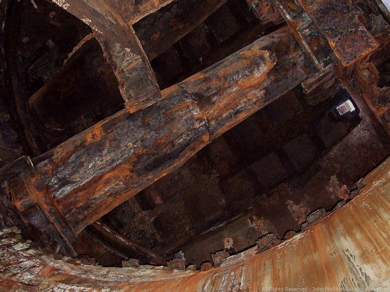 Battery Marshall - A straight up view of the left side 14 inch barrel with its breech at the rear of the turret. The right side barrel which is still horizontal can just be seen above it.