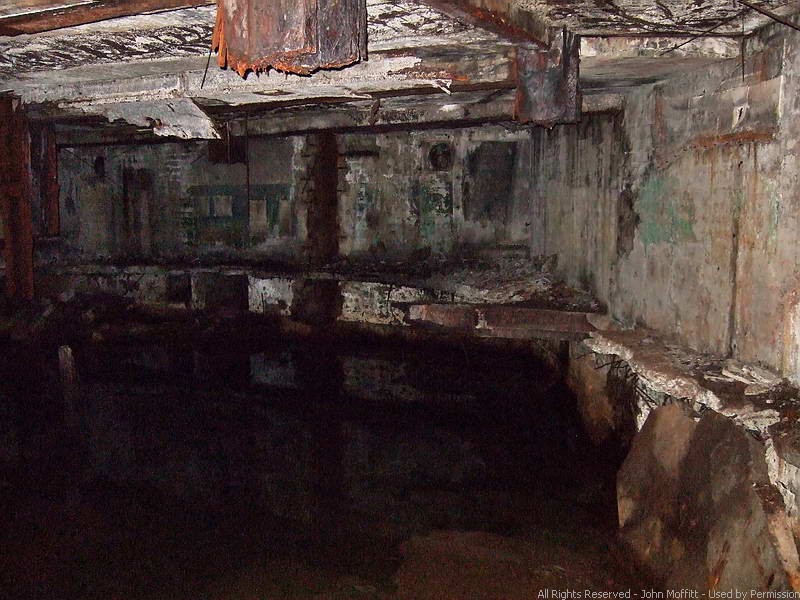 Watch your step -  the floor above the forward powder magazine has collapsed - probably due to the removal of the 'I' beams supporting the floors throughout the fort.