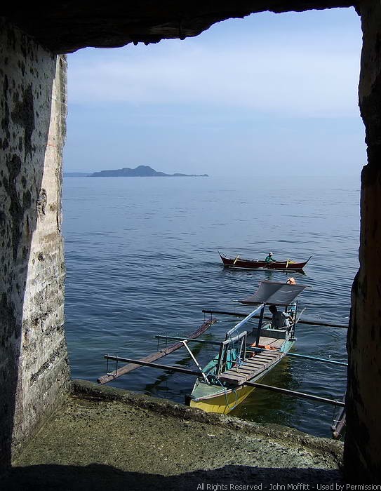 View out the Sally port. The closest island is Caballo with Corregidor behind it to the left